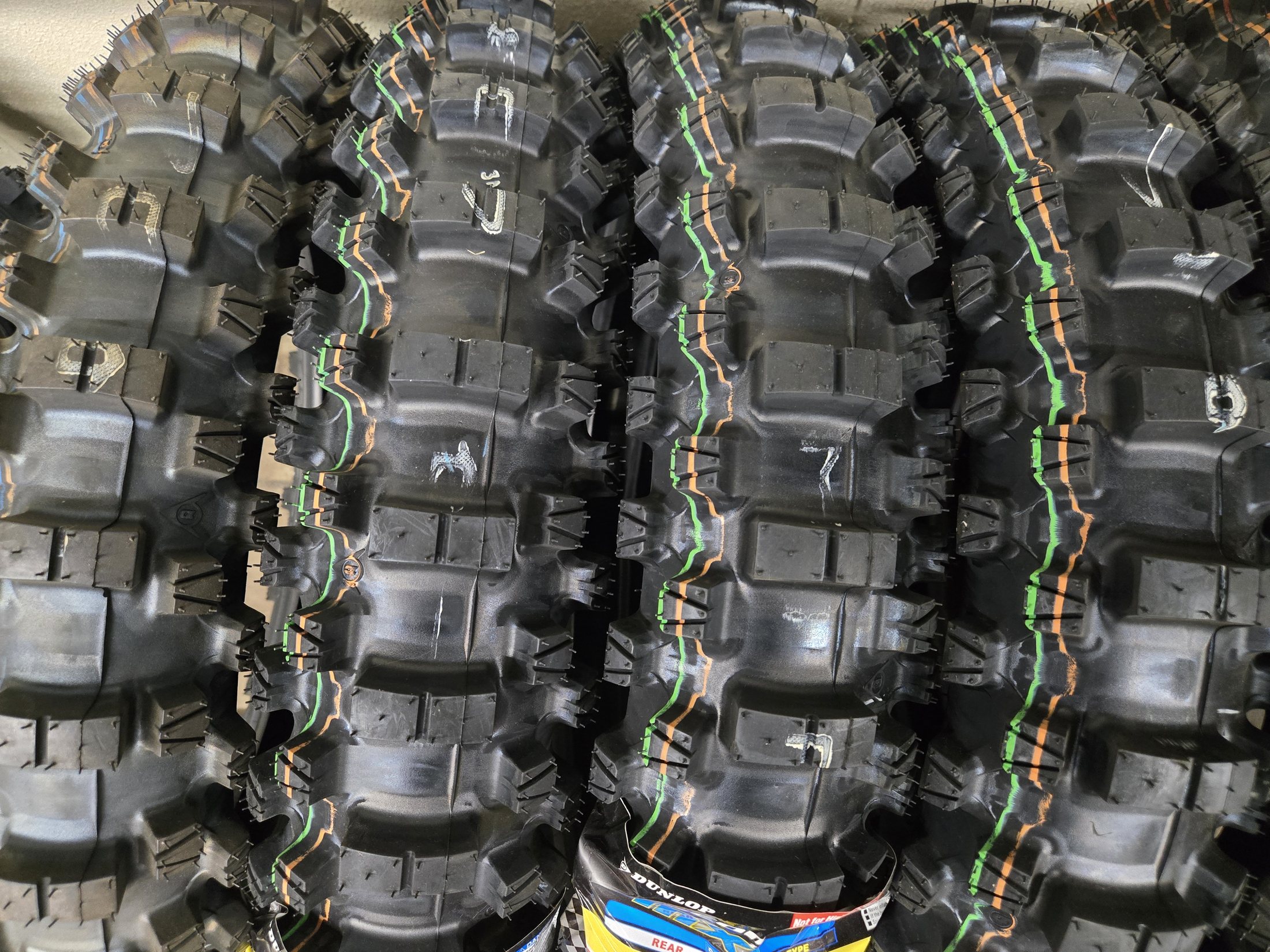 Close-up of a dirt bike tire tread pattern in stock at Rickie's Shop